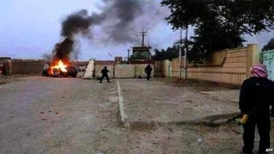 Security vehicle burns in Mosul, 10 June