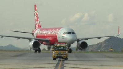 Air Asia aircraft on a runway