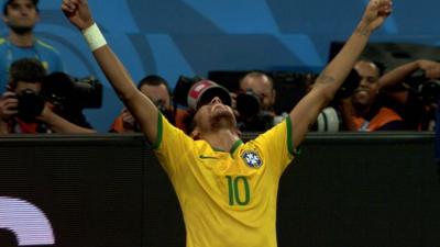 Brazil striker Neymar celebrates scoring Brazil's second goal