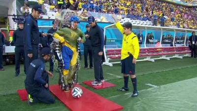 Man in robotic suit kicks-off World Cup