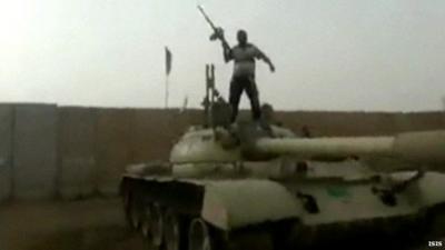 Footage shows ISIS militant on captured government tank