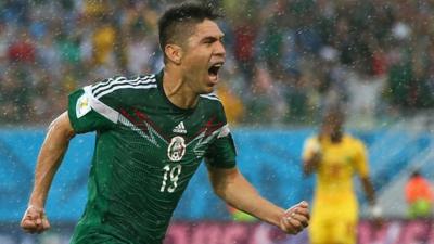 World Cup 2014: Mexico's Oribe Peralta celebrates the winner