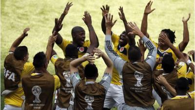 Colombia celebrate their first goal during a 2-0 win over Greece