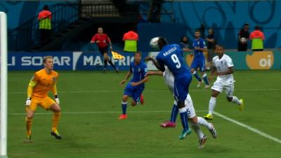 Italy's Mario Balotielli scores against England