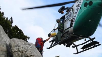 Helicopter brings supplies to mountain rescue team (12 June)