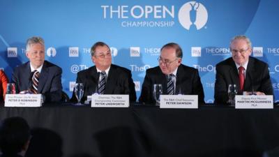 Northern Ireland First Minister Peter Robinson and Deputy First Minister Martin McGuinness with R&A chief executive Peter Dawson and Open Championship committee chairman Peter Unsworth at Monday's announcement