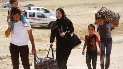 Family flee violence in Iraq