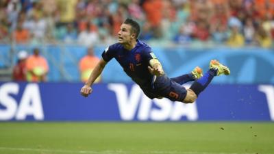 Robin Van Persie leaping to score