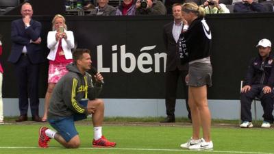 Martin Emmrich proposes to Michaella Krajicek on court