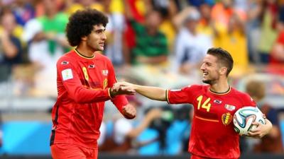 Marouane Fellaini and Dries Mertens celebrate as Belgium beat Algeria 2-1 at the 2014 Fifa World Cup in Brazil