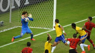 Mexico goalkeeper Guillermo Ochoa denies Brazil.