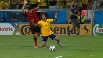 Brazil's Marcelo dives against Mexico