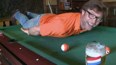 A fan 'Persieing' on a pool table