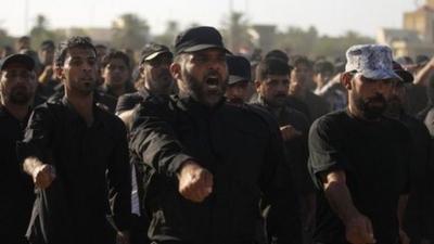 Volunteers training at a base in Najaf, 100 miles (160km) south of Baghdad, Iraq, on 17 June