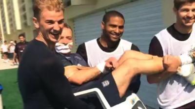 England's Joe Hart, Glen Johnson and Steven Gerrard carry Paul Small