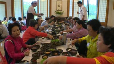 Korean women eating