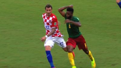 Cameroon's Alex Song sees red after punching Croatia's Mario Mandzukic