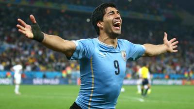 Uruguay's Luis Suarez celebrates after scoring his second goal against England