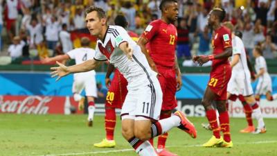 Germany's Miroslav Klose scores