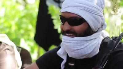 He is identified in the video as Brother Abu Bara' al Hindi