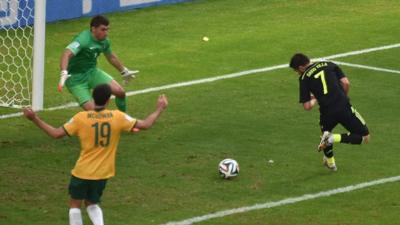 Spain's David Villa scores with skilful backheel