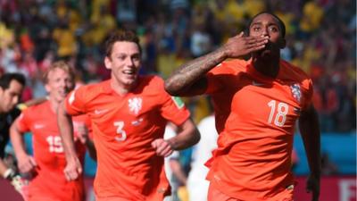 Netherland's Leroy Fer scores for the Netherlands