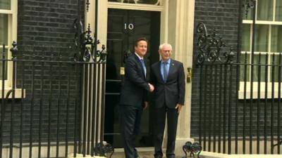 David Cameron and Herman Van Rompuy shake hands on the doorstep of Number 10.