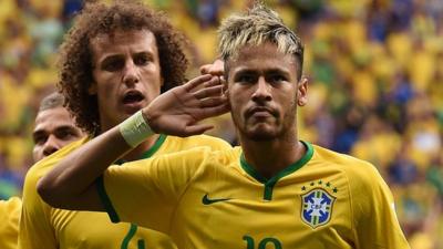 Brazil's Neymar celebrates scoring the 100th goal of the tournament