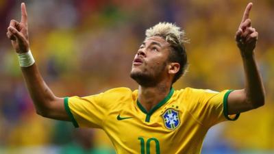 Brazil's Neymar celebrates goal against Cameroon