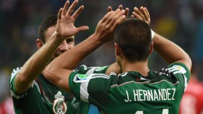 Mexico's Javier Hernandez scores their third goal against Croatia