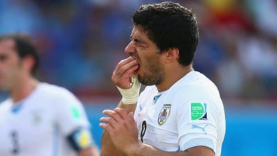 World Cup 2014: Uruguay's Luis Suarez appears to bite Chiellini