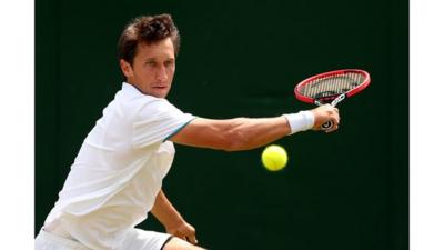 Ukraine's Sergiy Stakhovsky in action at Wimbledon