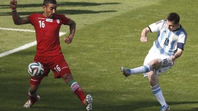 Argentina's Lionel Messi scores the winning goal against Iran