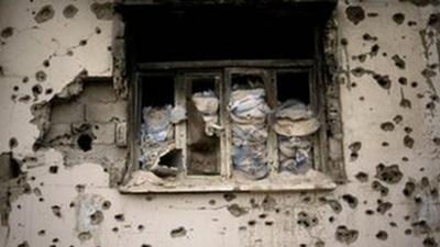 Bullet-riddled house in Homs, Syria