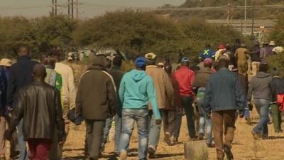 Miners returning to work in South Africa