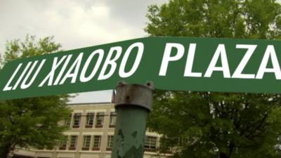 Street sign reading 'Liu Xiaobo Plaza'