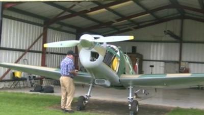 Man beside Spitfire