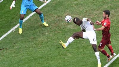 Ghana defender John Boye scuffs a clearance into his own net to give Portugal the lead in their crucial Group G match in Brasilia.