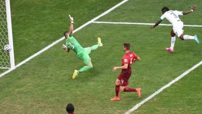 Asamoah Gyan heads in the equaliser against Portugal after a delightful cross from Kwadwo Asamoah