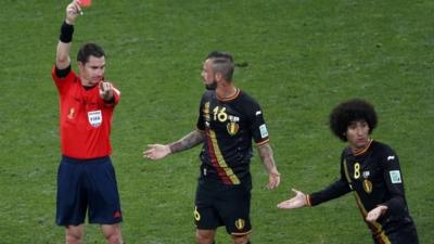 Belgium's Steven Defour is given his marching orders