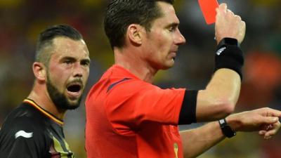 Belgium's Steven Defour is given his marching orders