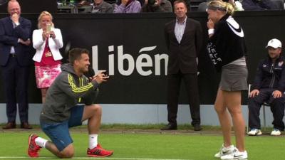 Martin Emmrich gets down on one knee and proposes to Michaella Krajicek