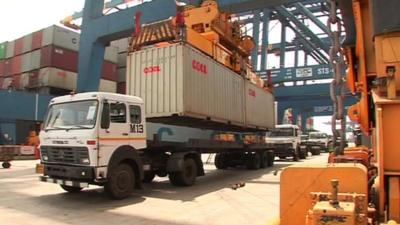 A truck loading goods for export