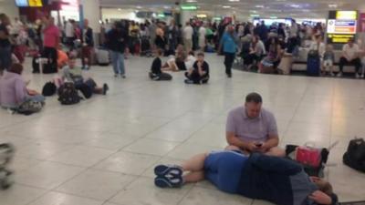 People waiting at Gatwick