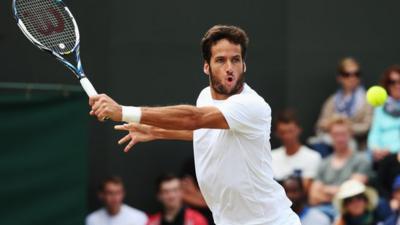 Feliciano Lopez against John Isner at Wimbledon