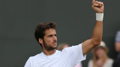 Feliciano Lopez celebrates win against John Isner at Wimbledon