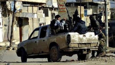 Undated photo showing members of the the Islamic State in Iraq and the Levant (ISIS) in Raqqa (14 January 2014)