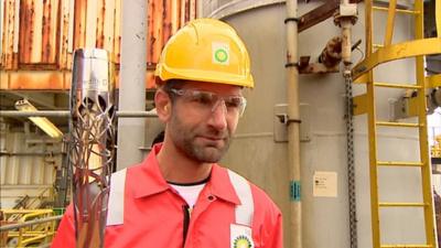 Queen's baton on an oil platform