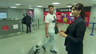 Single passenger and member of airport staff