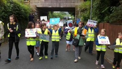 Pupils and parents protest